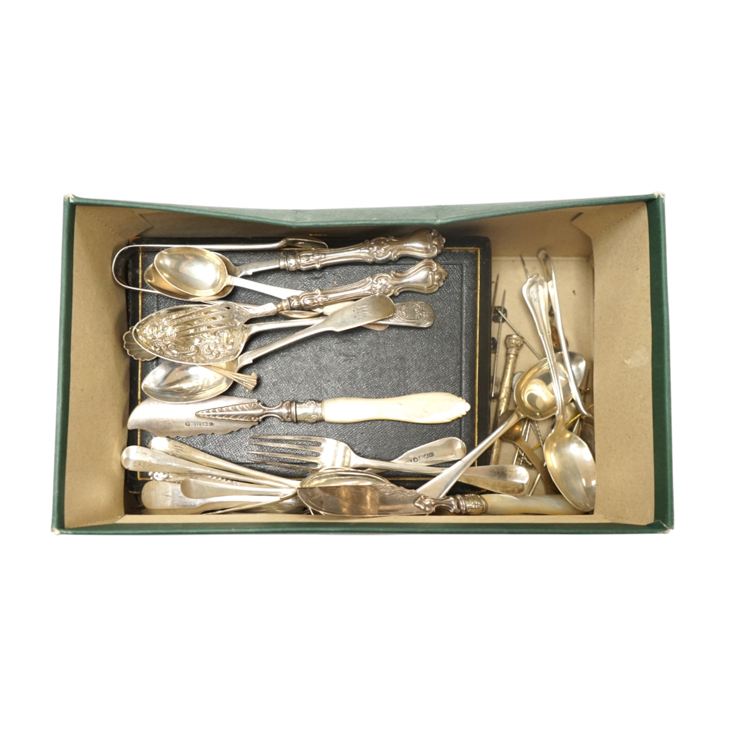 A collection of mainly base metal tie or hat pins and various silver and base metal souvenir spoons and a quantity of assorted 19th century and later silver and other flatware. Condition - poor to fair to good